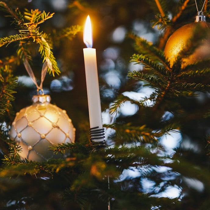 A box of 20 Christmas Tree Candles made by Havi, since 1829. Made in Finland written on the box