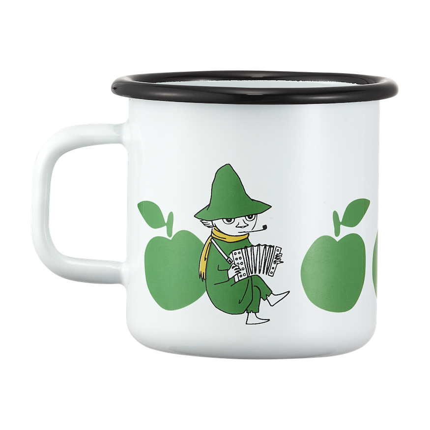 Two enamel mugs with green Moomin apple designs, a bottle of lemonade, and green apples on a light surface.
