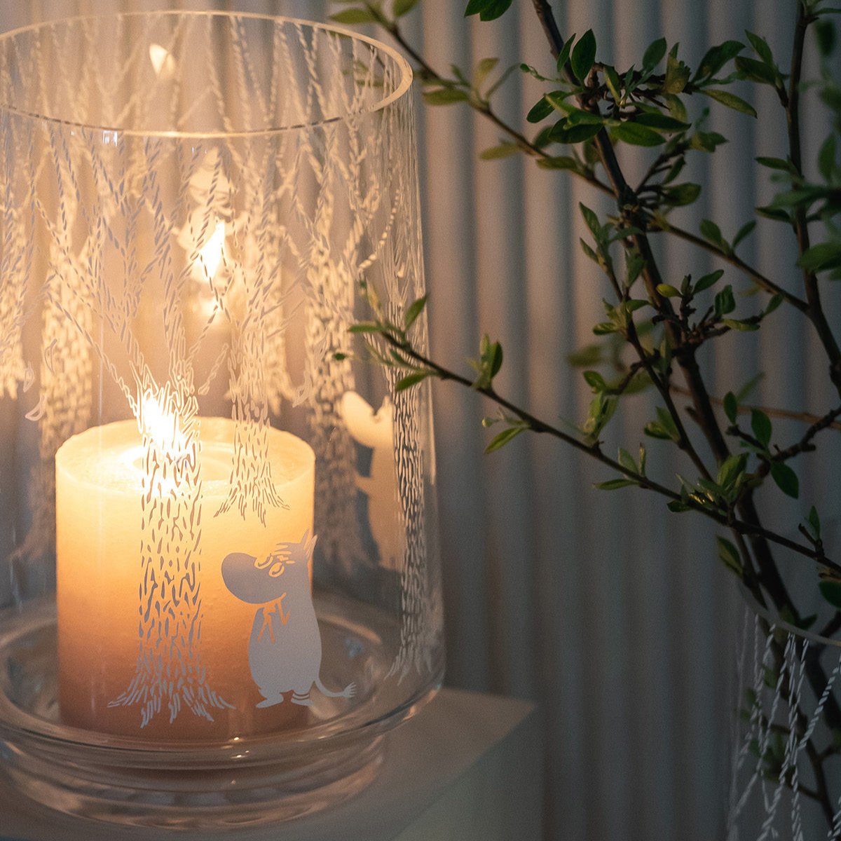 Moomin In the Woods Candle Vase by Muurla Design.  Beautiful soft candle light shining through the Vase Moomin decor.