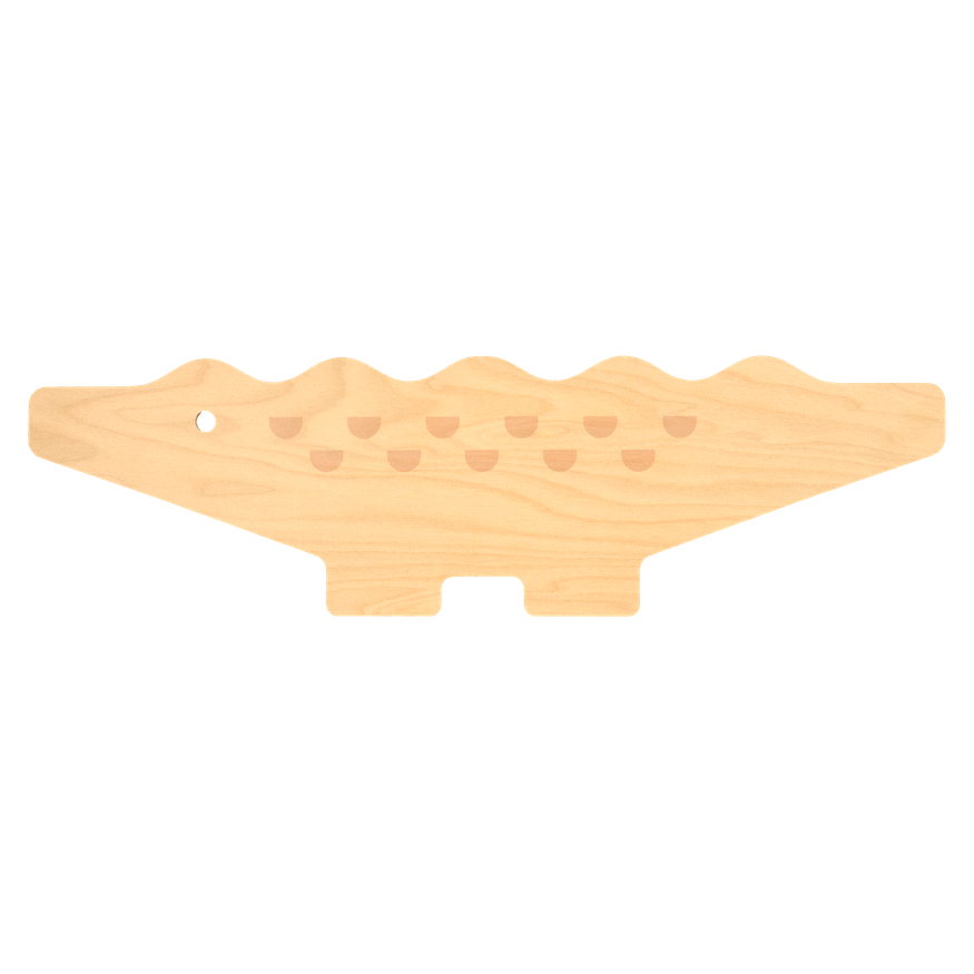 Croc Wooden chop and serve board with wavy design on a white background