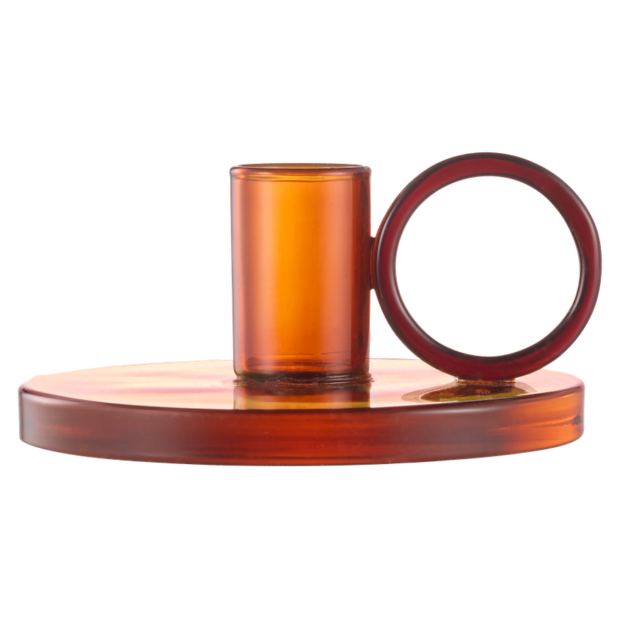 Loop Candle holder in Amber on a white surface with a blurred background