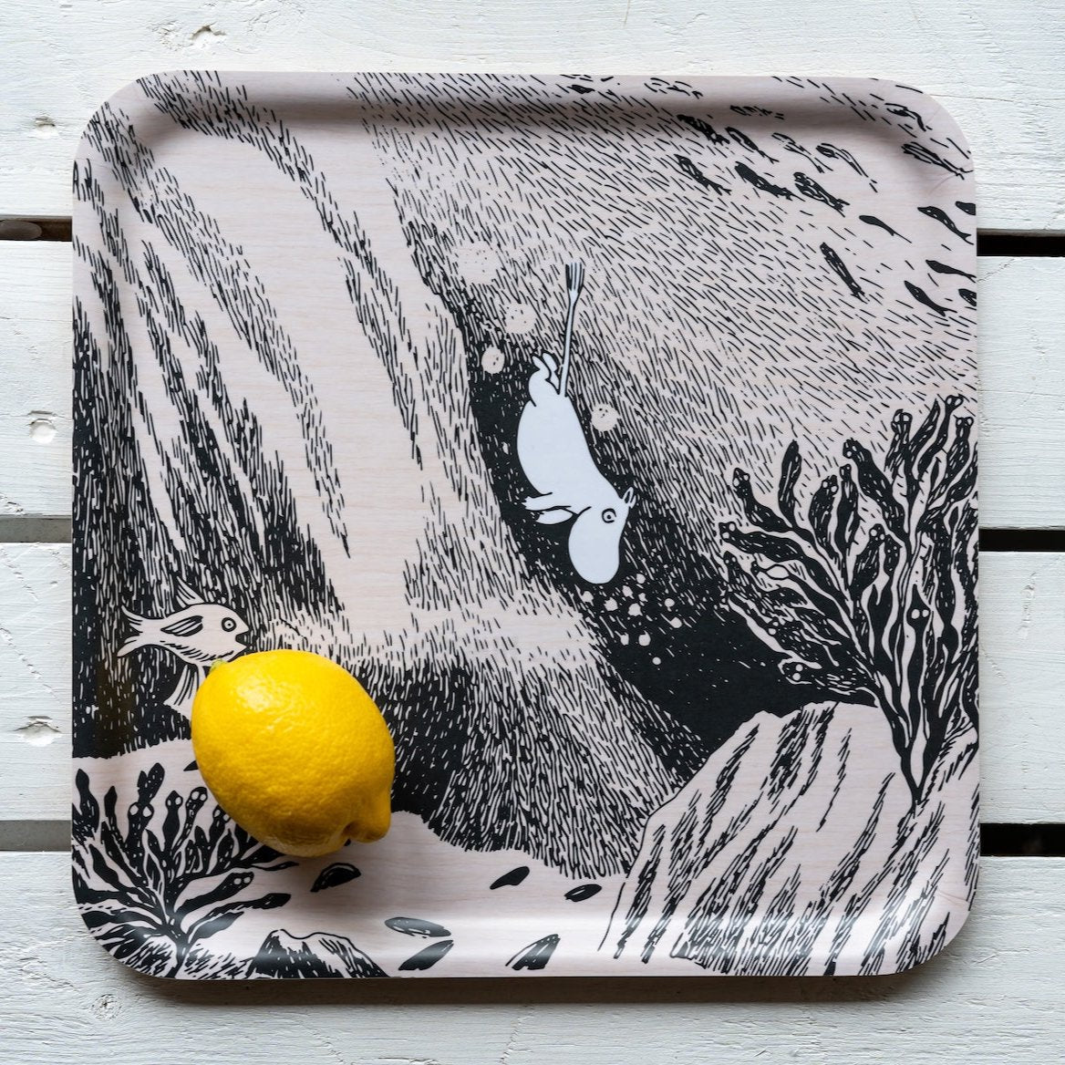 Moomin by Muurla The Dive Tray 33 x 33cm.  Black and White design featuring Moomintroll.   A lemon is displayed on the tray