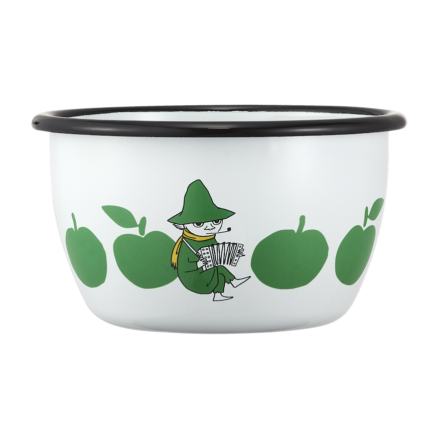 Two small bowls with Moomin green apple designs on a beige surface with green apples around.