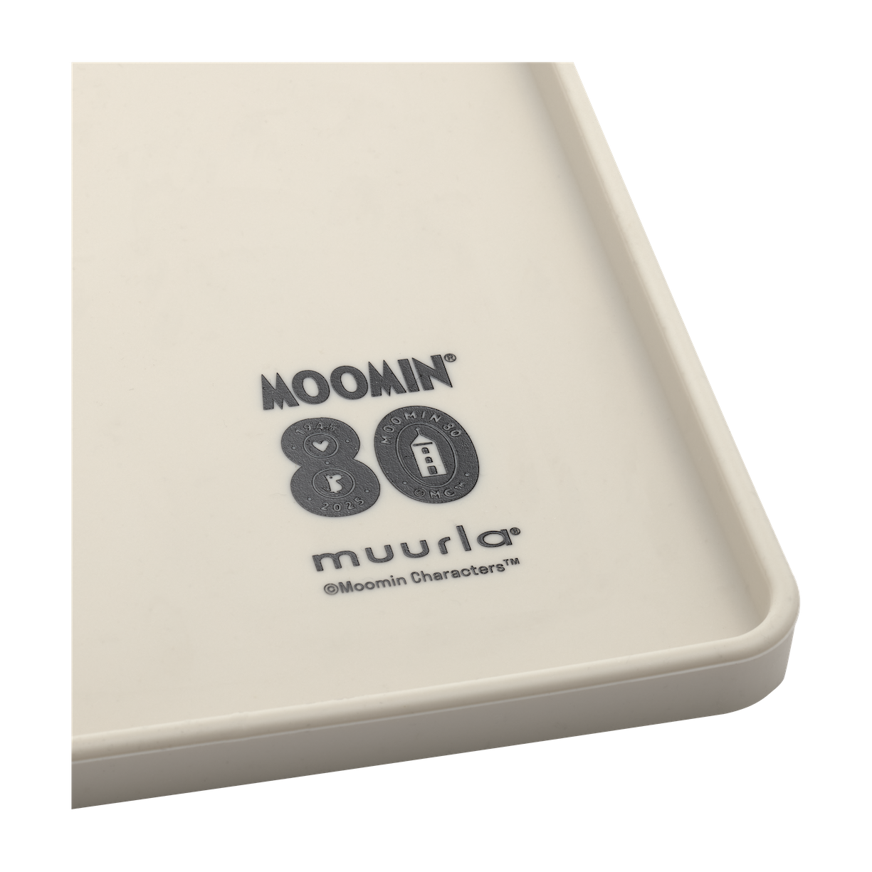 Placemat with black illustrations of Moomin characters