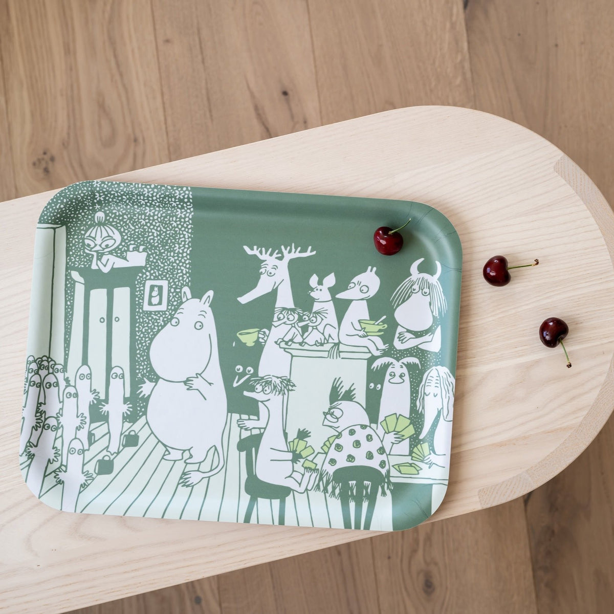 Moomin Tray &#39;Room For All&#39;  - a white design showing lots of Moomin Characters on a green background. 