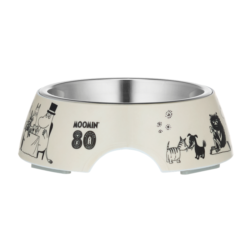 A  Jack Russel is tucking into some food out of a Moomin For Pets Bowl 14cm Diameter, 4.5cm high. Part of the Moomin 80 Collection by Muurla Design
