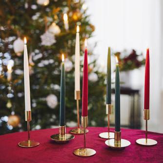 Christmas setting of Havi Antique Tapered Dinner Candles.  Red, Green and white candles on display