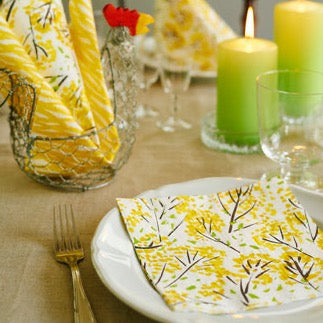 Tabel setting with Havi Forsythia Napkins and Green candles