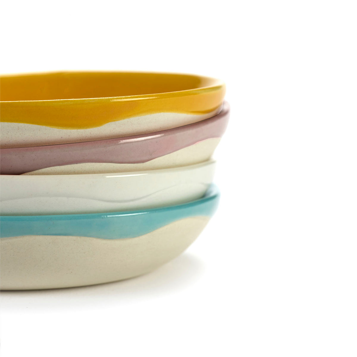 Ottolenghi for Serax Feast collection, side view of small dishes stacked, with four of the five coloured designs.