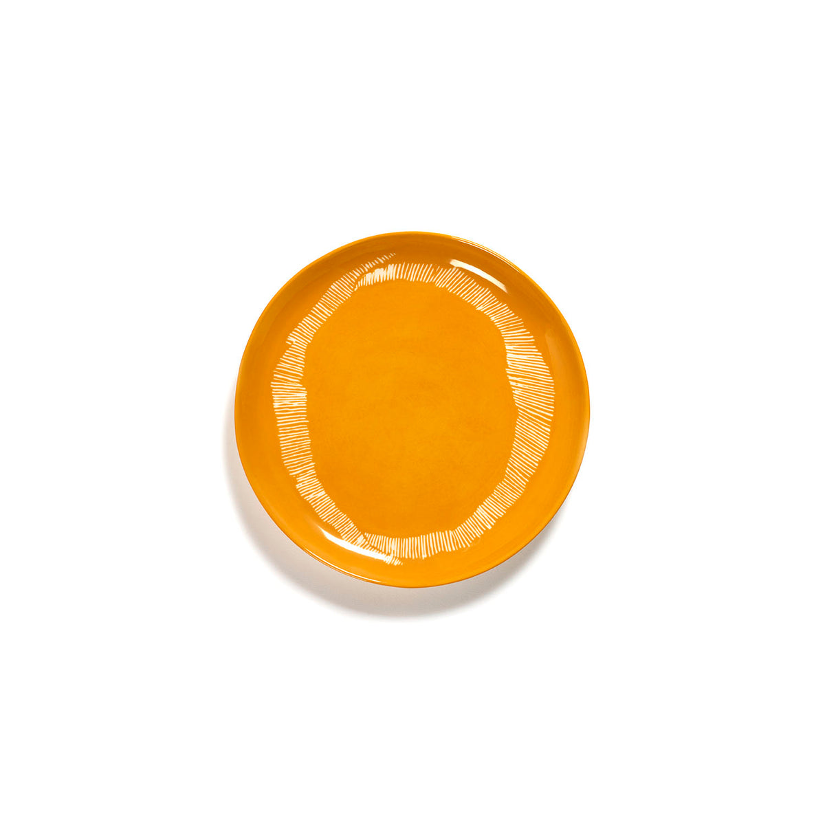 Ottolenghi for Serax Feast collection; medium plate, with sunny yellow swirl-stripes white design.
