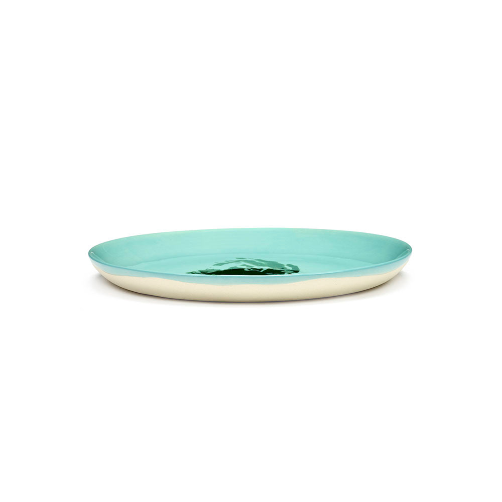 Ottolenghi for Serax Feast collection; side view of medium plate, with azure artichoke green design.