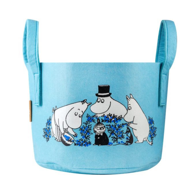 A blanket stored in a Muurla Design Blueberries Storage Basket 