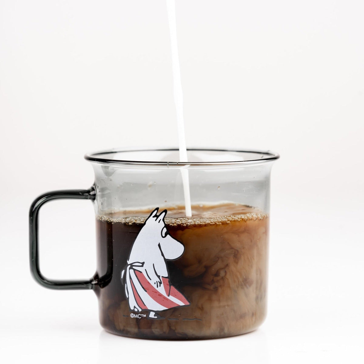 Moominmamma Glass Mug full of hot coffee