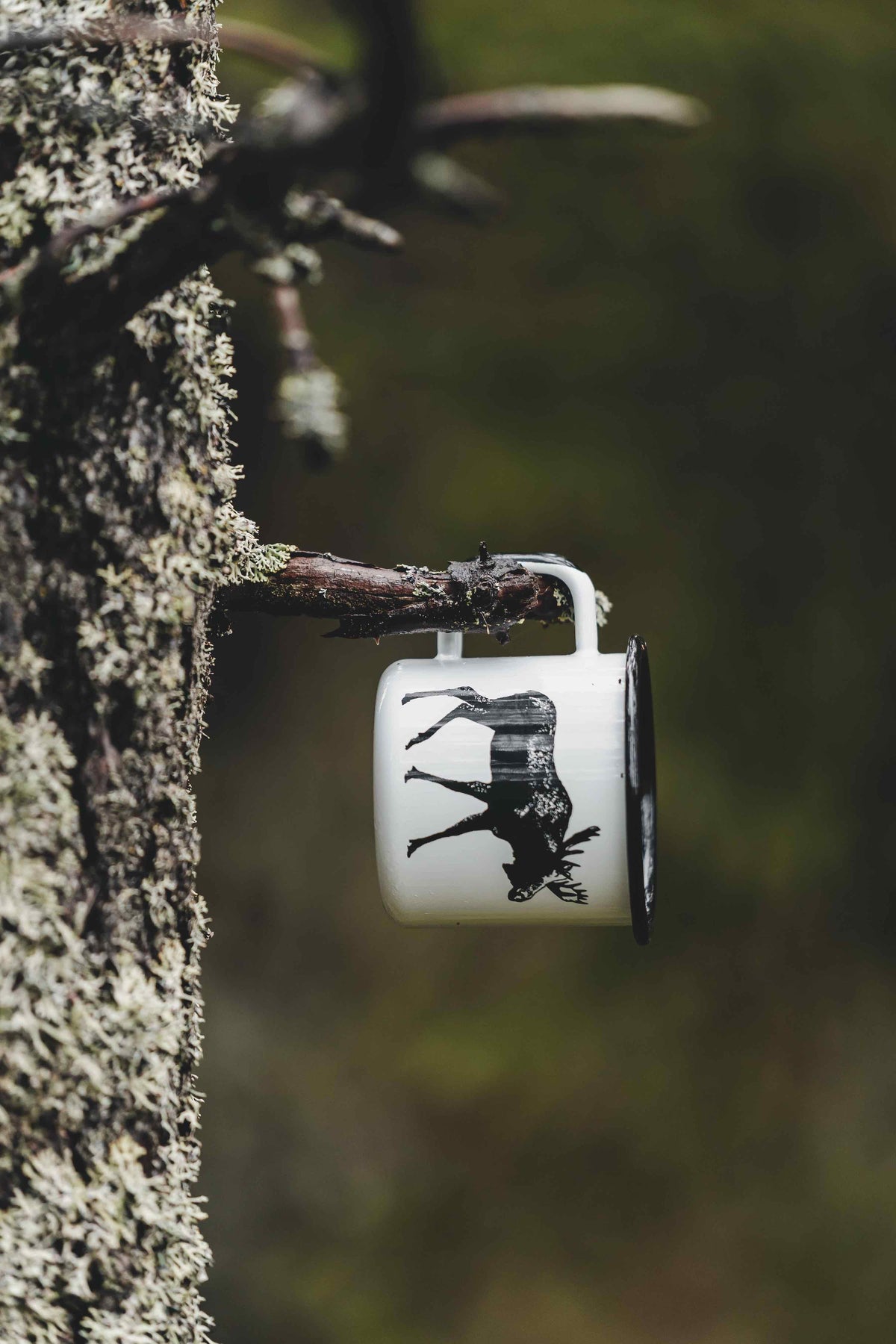 Nordic Mug by Muurla Design hanging on a tree