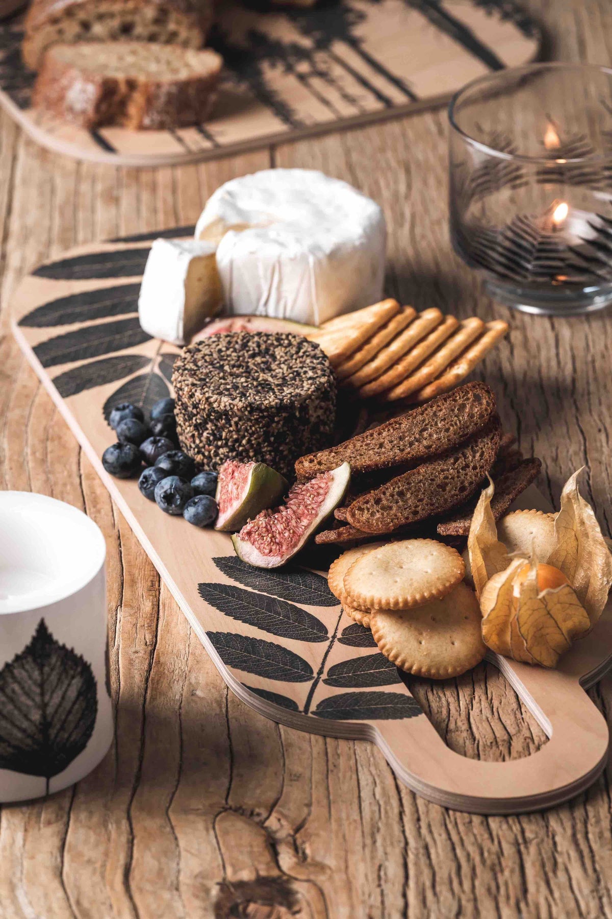 Muurla Nordic Chop and Serve Board filled with cheese, meats and biscuits!