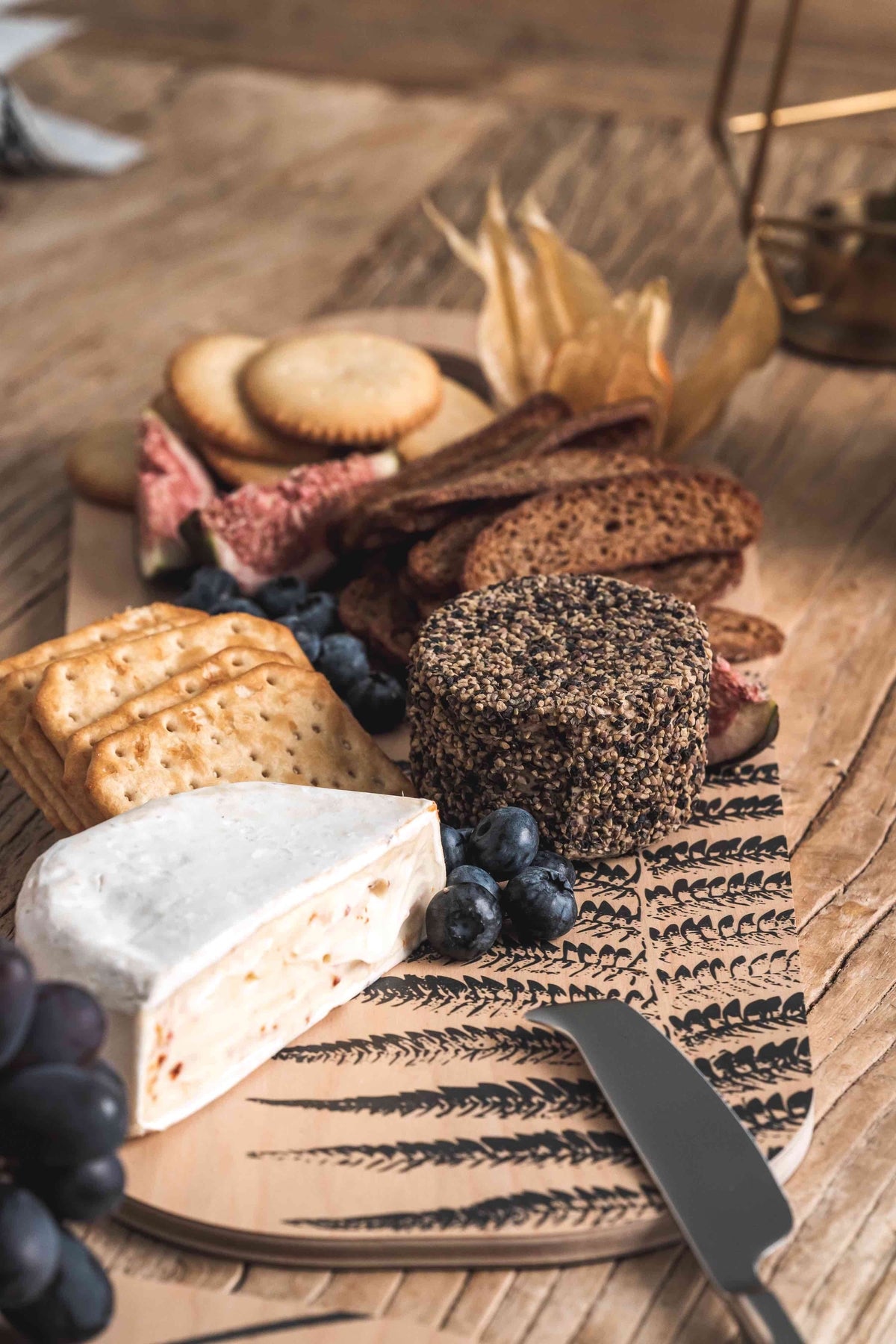 Muurla Nordic Chop and Serve Board filled with a smorgasbord of Scandinavian delicacies