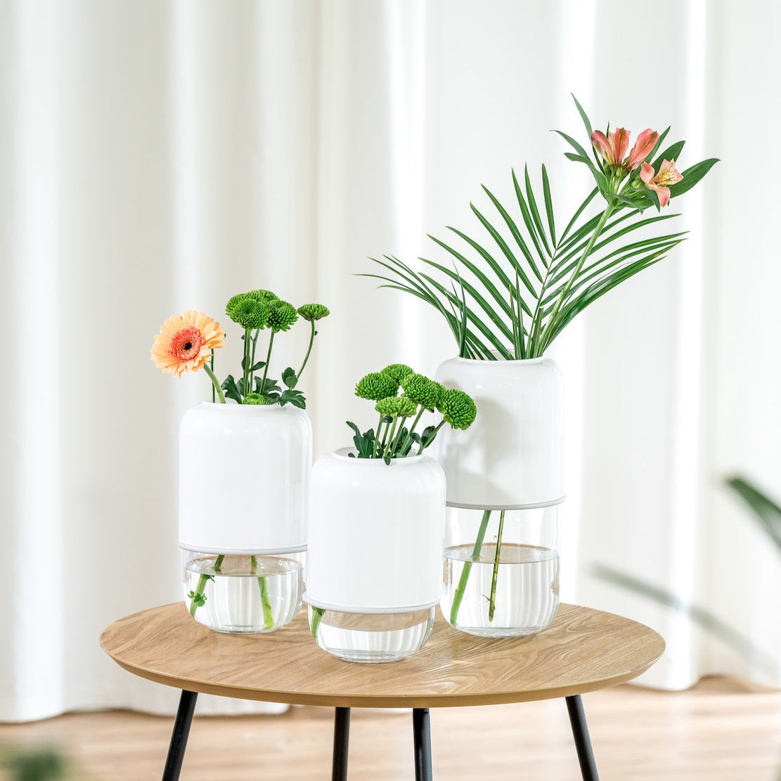Muurla Design Capsule Vase in White, showing different height options