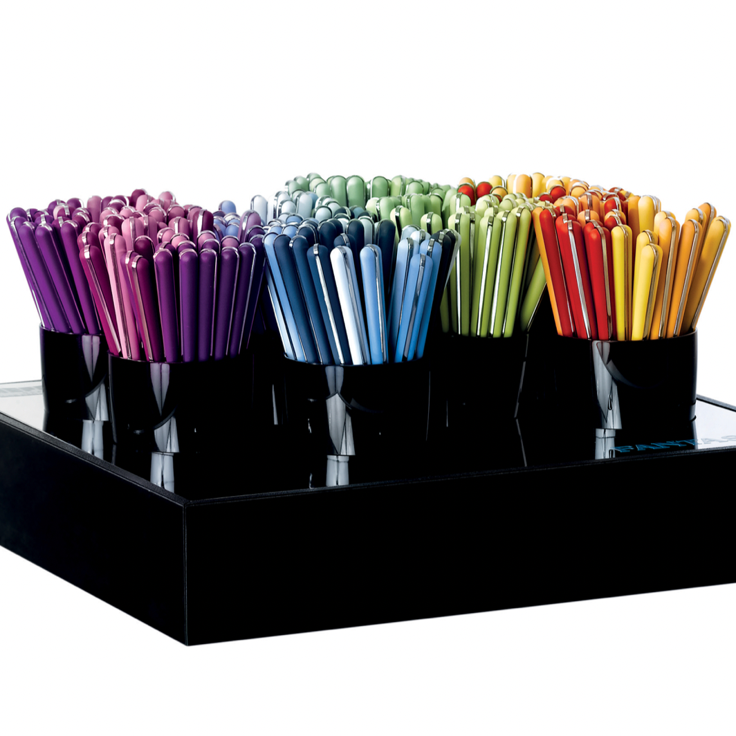 Mepra Fantasia Cutlery Coloured Handles on display in black pots